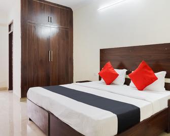 Hotel O Mittal Tower - Jhājra - Bedroom