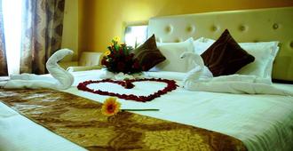Mango Hotels Nagpur - Nagpur - Schlafzimmer