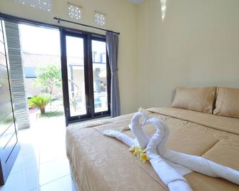 Ratu Guest House - Kuta - Habitación