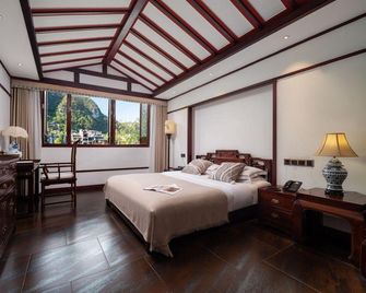 Qiujiang Wandu Jiangnanyuan Inn - Qiandongnán - Habitación