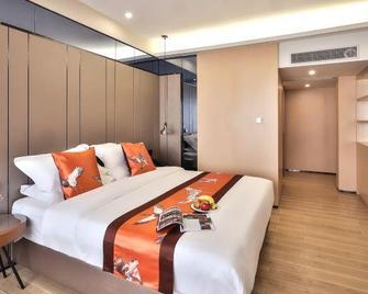 Overseas Chinese Mansion Hotel (Shantou China Travel Service Bufeng Lotus Shop) - Shantou - Bedroom