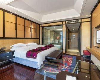 Longdu Jingyi International Hotel - Qiandongnan - Bedroom
