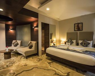 Bizz The Hotel - Rajkot - Yatak Odası