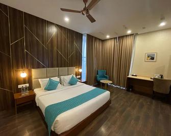 Hotel Krinoscco - Faizābād - Habitación