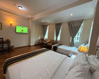 Grand Laurel Hotel - Rangoon - Chambre