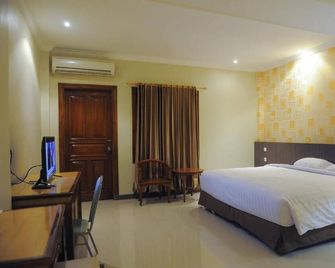 Sylvia Budget Hotel - Kupang - Slaapkamer