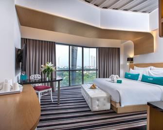 ذه وان أو وان دارماوانغسا سيدايو جاكارتا - جاكرتا - غرفة نوم