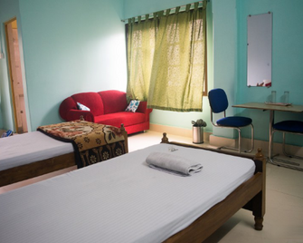 Sewak Lodge - Silchar - Bedroom