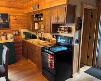 Escape to the Lake - Rustic 3-bedroom log-sided cabin nestled amongst the pines - Spooner - Kitchen
