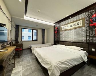 Harbin Walker Coffee Hotel - Cáp Nhĩ Tân - Phòng ngủ