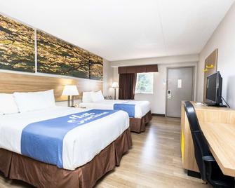 Days Inn by Wyndham Dayton Huber Heights Northeast - דייטון - חדר שינה
