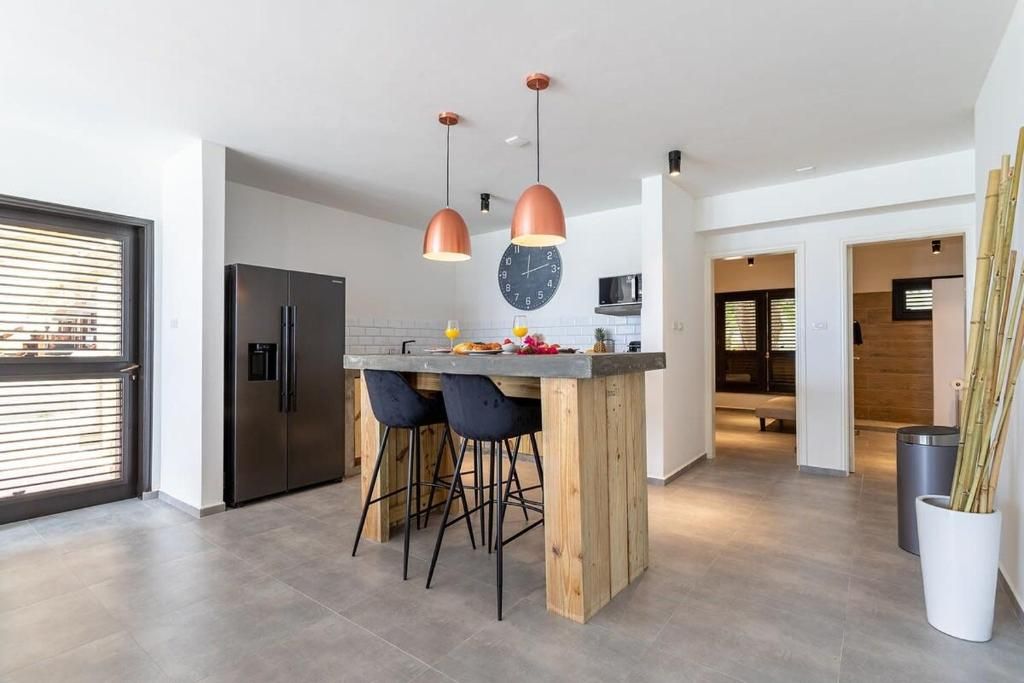 Dining room view of Epic Oceanfront Apartment with Sunset and Sea View