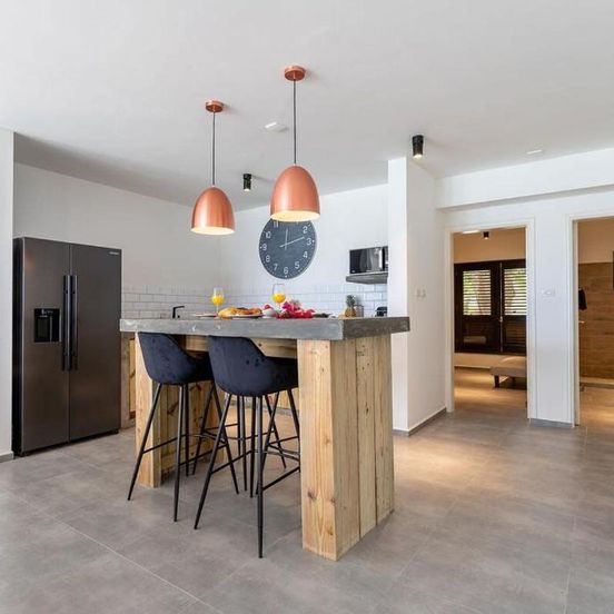 Dining room view of Epic Oceanfront Apartment with Sunset and Sea View