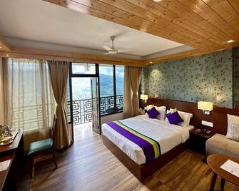 تيمبو هيريتيدج ريزورت آند سبا - جانجتوك - غرفة نوم