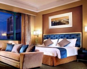 Hotel Ciputra Semarang managed by Swiss-Belhotel International - Semarang - Kamar Tidur