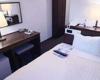 Hirosaki Grand Hotel - Hirosaki - Schlafzimmer