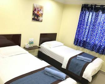 Maha Hotel - Puchong - Schlafzimmer
