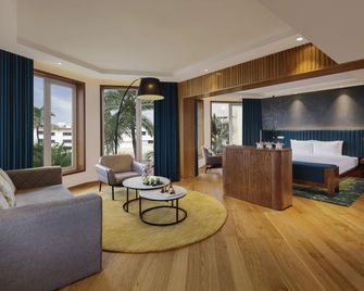 Novotel Mumbai Juhu Beach - Mumbai - Schlafzimmer