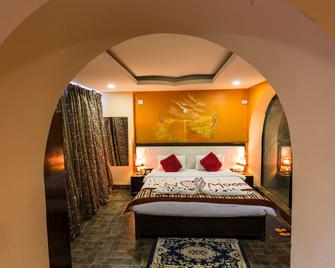 Hotel Royal Safari - Sauraha - Slaapkamer