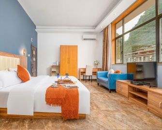 Yangshuo Yilai Hotel West street Branch - กุ้ยหลิน - ห้องนอน