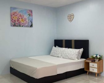 Capital O 91153 Chalet Dusun Duriyan - Sungai Petani - Slaapkamer
