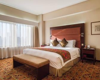 Dalian Grand Continent International Hotel - Dalian - Schlafzimmer