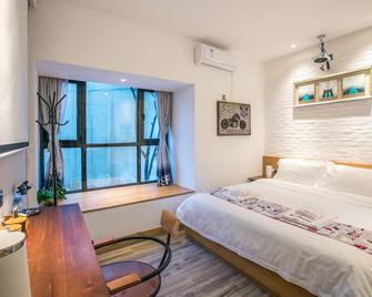 Maan Coco Travelling Boutique Inn - Shenzhen - Chambre