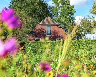 Peaceful vacation home with wide view. - Winschoten - Vista del exterior