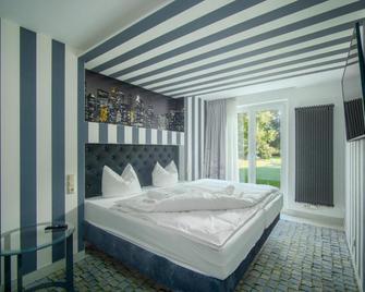 SL'otel im Parforcehaus - Bernburg - Schlafzimmer