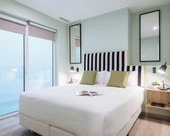Sercotel Sevilla Guadalquivir Suites - Seville - Bedroom