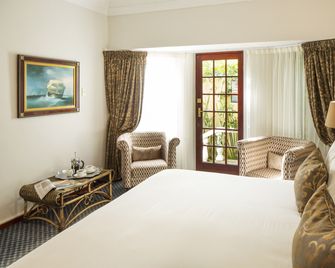 Kingfisher Guesthouse - Puerto Elizabeth - Habitación