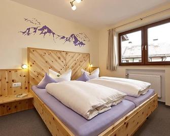Ferienwohnung Steigrain - Gästehaus Alpina - Bad Kohlgrub - Schlafzimmer