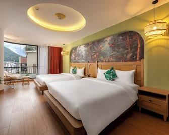 Tropical Paradise Sapa Hotel & Coffee - Sa Pa - Yatak Odası