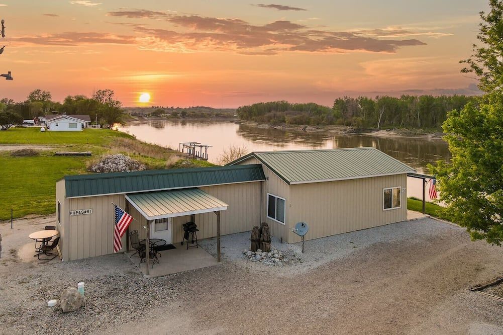Relaxing Riverfront Cabin Retreat | Ideal for Hunters & Fishermen