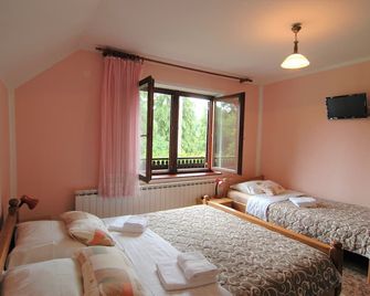 Plitvice Rooms Family Glumac - פליטביצ'קה יזרה - חדר שינה