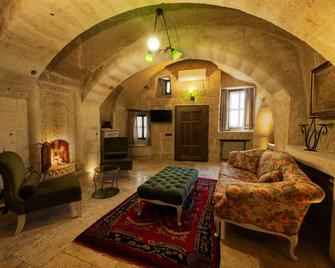 Tafoni Houses Cave Hotel - Urgup - Huiskamer