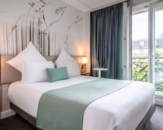 Hôtel Mercure Paris Montparnasse Raspail - París - Habitación