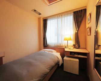 Hotel Sun Garden Matsuyama - Matsuyama - Soveværelse