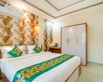 Treebo Thoduvas Star Plaza Cochin Airport - Nedumbassery - Bedroom