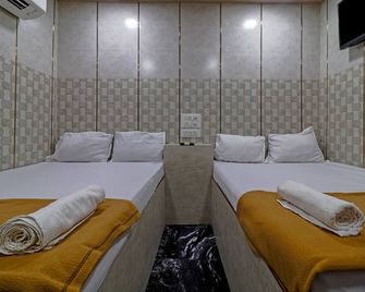 Capital Guest House - מומבאי - חדר שינה