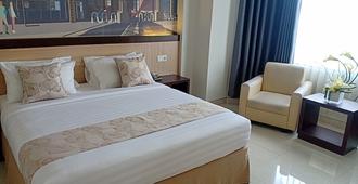 Hotel Mj - Samarinda - Bedroom