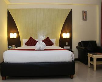 Ramanashree California Resort - Bengaluru - Schlafzimmer