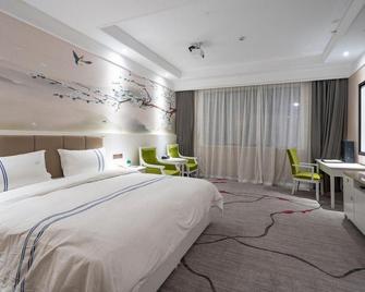 Xinghe International Hotel - Weinan - Habitación