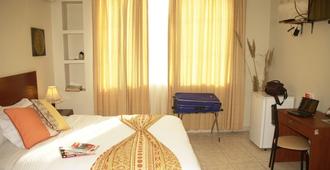 Hotel Air Suites - Guayaquil - Yatak Odası