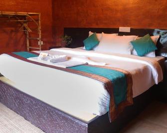 Ecotones Camps - Munnar - Soveværelse