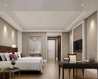 Greentree Eastern Yancheng Binhai Oubaoliya City Square Hotel - Yancheng - Schlafzimmer