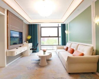 Haolai Business Hotel - Rizhao - Living room