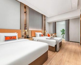 Echeng Hotel Guangzhou Sanyuanli No.5 Parking Apron Shopping Mall - Kanton - Slaapkamer