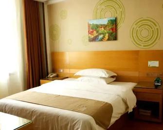 Greentree Inn Anqing Susong County North Longmen Road Express Hotel - Jiujiang - Bedroom
