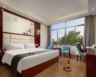 Wansheng Business Hotel - Changsha - Camera da letto